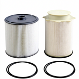 Two diesel filter cartridges and sealing rings on white